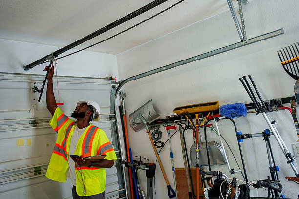 Professional Garage Door technician working in Spanaway, WA